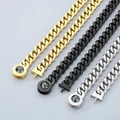 Detalle de tres cadenas cubanas de acero de titanio pulido en oro, negro y plata - Acero - Hebilla de Cristal Negro / Pulsera 21cm