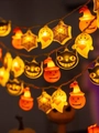 Dettaglio della ghirlanda LED a zucca e fantasma con calda luce arancione festiva - Set da 4 Pezzi di Halloween / 3M 20-LED (Modello a 3 Batterie)