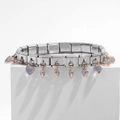 Detail showing stainless steel charm bracelet with purple heart crystals on white pedestal - Heart Pendant Purple (18 Links)