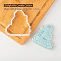 Christmas sleigh and gift fondant cookie cutter with blue icing sample 8.3x8.7cm - 8.3x8.7cm