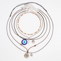 Set 6 collane boho a strati con ciondoli occhio di Allah, sole e albero della vita - Set da 6 Pezzi