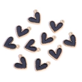 Detailed view of ten heart-shaped black enamel pendants with golden metal borders - Heart-shaped Beaded Style / Black