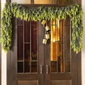 Realistic Norfolk pine Christmas wreath with four golden bells on vintage wooden door - 1.8m (33 Heads)