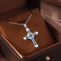 Silver cross pendant necklace with deep blue opal texture inlay and white stones - Cross