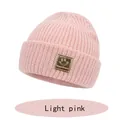 Cozy light pink cuffed knit beanie with golden smiley face label for infants - S (6-36 Months) / Pink
