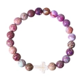 Macro view of purple and colorful stone beads with a white cross pendant on a white background - Imperial Turquoise Purple Mixed