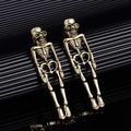 Orecchini a scheletro vintage in bronzo con design articolato di scheletro umano completo - Oro