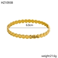 Macro shot of 18K gold plated beaded open bangle with dimensions 6.0cm by 0.6cm - Inner Diameter 6.0cm Width 0.6cm / Gold (Beaded)