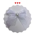 White lace bow with pearl accent on decorative round card for doll accessories - White