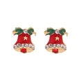 Close-up of Christmas bell earrings with red lacquer, green bow, and sparkling crystals - Red Bell