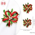 Christmas napkin ring with red and green enamel bow, holly leaves and white rhinestones - Wreath Bow Style 89