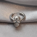 Polished silver skull pendant hoop earring for men on grey silk background - 3D Skull Head Pendant Hoop
