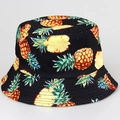 Reversible bucket hat featuring realistic pineapple print on a black cotton background - M / Black Pineapple