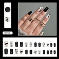 Detail of French minimalist black and white press-on nails with abstract face line art - Artistic Lines Design (R796)