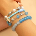 Bracciale multistrato con perle blu a stella marina e conchiglia dal design oceanico - Set da 4 Pezzi Stile Oceano (29 Set di 4 Bracciali)