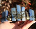 Macro detail of gothic crown with blue crystals, bronze butterfly and animal skulls - Butterfly Raven Skull Style / Blue Aventurine/Antique Bronze Wire