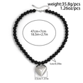 Collar de cuentas negras para hombre con colgante de corazón plateado y dimensiones - Negro