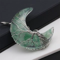 Close-up of green crystal moon pendant with silver wire-wrapped tree of life design - Aventurine Gravel-Moon