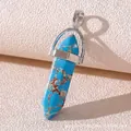 Close-up of hexagonal blue turquoise stone pendant with silver metal clasp detail - Light Blue Veined Stone