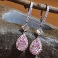 Elegant pink pear-cut zircon drop earrings with halo crystals on a wooden branch - Pink Teardrop Style (E2171)