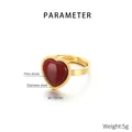 Detail view of 15mm heart-shaped red pine stone ring with 18K gold plated steel - US 6 / Gold Heart With Red Pine Stone (KR108063-GC)