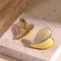 Elegant geometric two-tone heart stud earrings in gold-tone steel on a marble surface - ER-204 Yellow Heart / Yellow