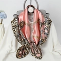 Pink silk square scarf with leopard print and baroque gold chain patterns tied on a shirt - Dusty Pink Chain