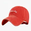 Classic red washed cotton baseball cap featuring white 'hair day' script embroidery - Adjustable / Orange (Bad Hair Day)
