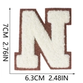 Detail view of chenille letter N patch in brown and white with dimensions 7cm x 6.3cm - Letter N