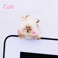 Close-up of cute mini cat resin ornament hanging on computer monitor edge decor - Cat Monitor Hanger