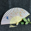 Classic bamboo folding fan with purple floral print and small bird patterns - Birds Singing and Flowers Blooming - Elegant Pink