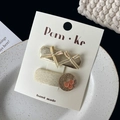 Handmade golden bow and pink sequin hair clips set on a decorative white plate - Bow with Button Clip