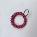 Flexible dark pink spiral spring wrist keychain with silver stainless steel ring connector - Deep Pink