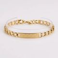 Macro detail of gold-plated cuban link bracelet with textured rectangle plate and lobster clasp - Square Geometric Pattern