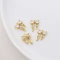 Close-up of 14K gold plated bow heart pendant with zircons showing 9x14mm dimensions - Bow / Gold