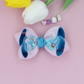 Close-up of a pink and blue grosgrain ribbon hair bow with a heart-shaped sequin shaker - Tiffany Blue