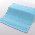 Soft light blue cotton hand towel with absorbent loops and decorative embossed stripes - 34x34cm / Sunny Blue