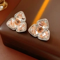 Close-up of diamond-encrusted flower earrings with champagne crystal and silver plating - Silver Earring Post-White