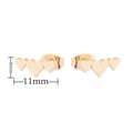 Detailed macro view of triple gold heart stud earrings showing 11mm width and 4mm height - Triple Heart / Gold