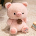 Cute pink plush pig doll with soft fur and embroidered love heart on the foot - Sitting Pink Pig