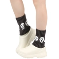 Detail of dark grey knitted leg warmers featuring white skull patterns on the cuff - One Size / Dark Gray