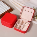 Portable red square PU leather jewelry box with zipper closure and velvet interior - Red