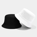 Detail view of corduroy texture on black and white reversible bucket hats for winter - One Size / White