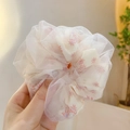 Close-up of white sheer scrunchie featuring pink floral patterns in soft natural light - Beige Lace Double Layer Large
