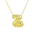 Close-up of golden balloon letter Z pendant necklace with sparkling cubic zirconia - Letter Z / Gold
