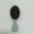 Mini light green scalp massage hairbrush with nylon bristles and airbag cushion - Elastic Paint Mint Green Bristle