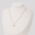Gold-tone titanium steel necklace with white heart shell pendant on jewelry bust - Heart Mother of Pearl Splice Chain / Gold