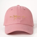 Pink baseball cap with gold Mama Est. 2025 embroidery and bow detail on cotton twill - One Size / Deep Pink