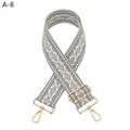 Detail of adjustable gray diamond pattern woven shoulder strap with gold metal lobster clasps - Gray