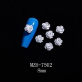 Detailed macro view of 8mm pearl white 3D resin rose flower nail art charms on black silk - 8mm / Pearl White